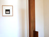 Carles Valverde, exhibition view: 2011, Olschewski & Behm, Frankfurt; untitled, 2011, sandpaper / paper, 55 x 55 cm; untitled, 2008, patinated steel, 210 x 40 x 40 cm